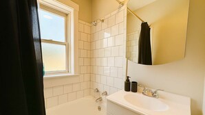 Shower, hair dryer, shampoo
