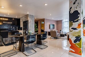 A modern interior with a dining area, kitchen, and living space. - Balsas Urban Escape | Near Reforma (Mexico City)