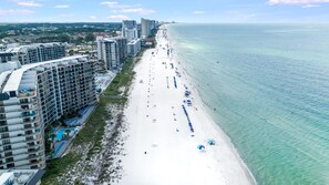 A coastal hotel with multiple floors, a beachside location, and a view of the ocean. - Edgewater T2 703 - 3 Bedrooms! (Panama City Beach)