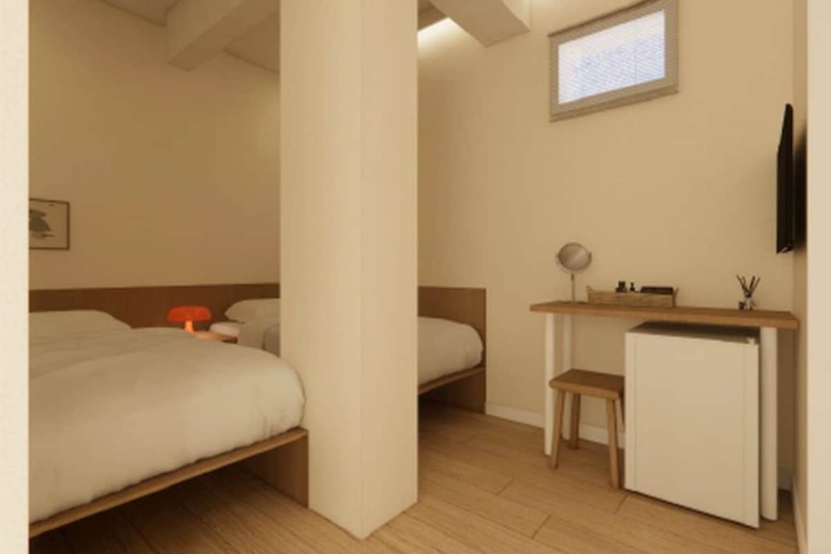 Habitació amb dos llits individuals econòmica | Wifi gratuïta 