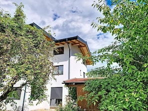A modern two-story building with a flat roof and a visible window. - "das maridl" by Interhome (Ried im Oberinntal)