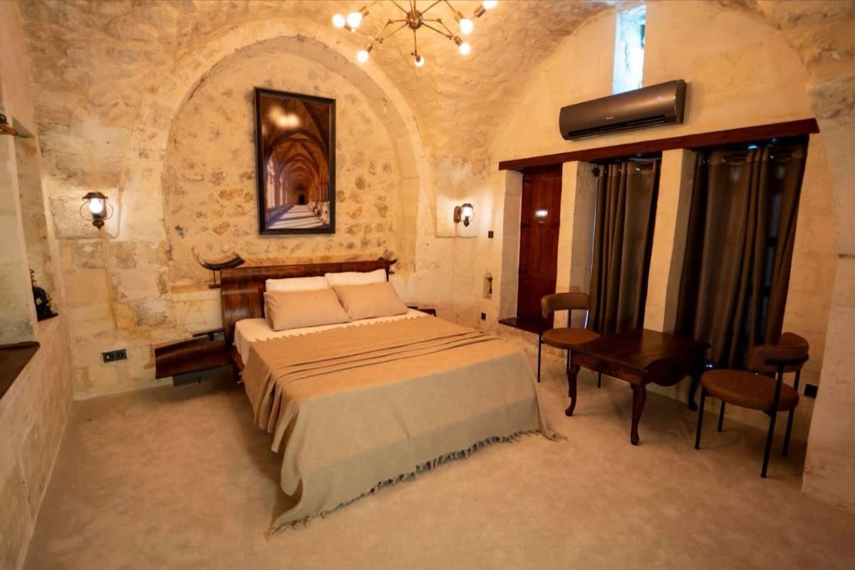 Suite, Patio, Courtyard View | In-room safe, laptop workspace, soundproofing, iron/ironing board