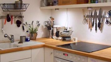 Fridge, oven, stovetop, dining table