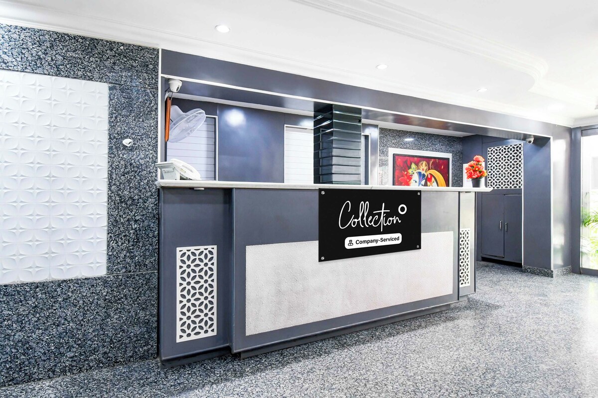 A reception desk with a sign that reads 'Collection Company-Serviced'.
