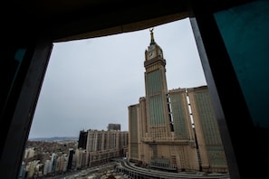 A view of a cityscape with a prominent clock tower and surrounding high-rise buildings. - Grand Al Massa Hotel (Makkah)