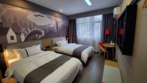 A hotel room with two beds, a TV, a desk, and a mural on the wall. - Thank (Changsha)