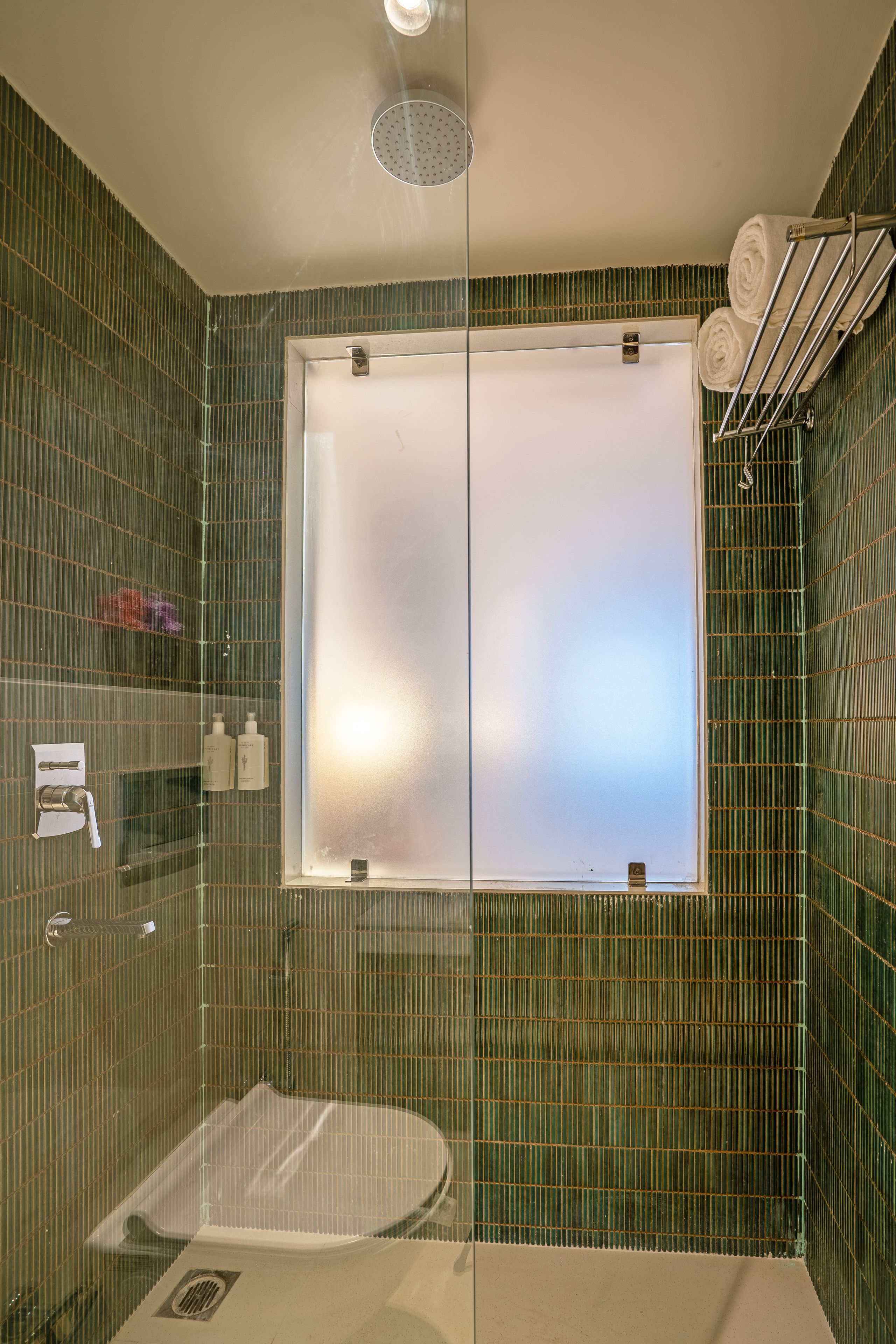 Hair dryer (on request), towels, soap, shampoo