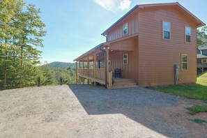 A two-story wooden cabin with a covered porch and a gravel driveway. - Furnished Deck w/ Views & Fire Table! Murphy Gem (Murphy)