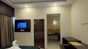 Desk, laptop workspace, iron/ironing board (on request), WiFi (free) - Hotel Elmont, Near EGL, Domlur (Bengaluru)
