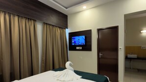 Desk, laptop workspace, iron/ironing board (on request), WiFi (free) - Hotel Elmont, Near EGL, Domlur (Bengaluru)