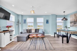 Living Room - Ocean + Intracoastal Views • Private Balcony • Private Beach Access • Resort Amenities • Pools (North Topsail Beach)