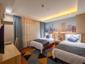 A hotel room with two beds, a desk, a chair, a nightstand, and a cityscape mural on the wall. - Chonpines Hotel (Shenzhen)