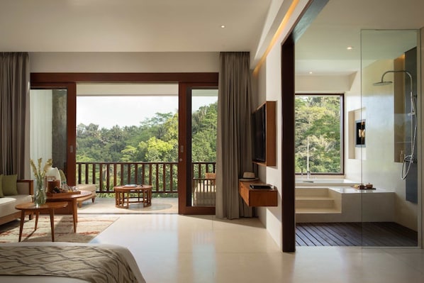 A modern hotel room with a balcony, a large window, a bathtub, and a television.