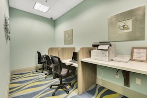 A conference room with individual workstations, a printer, and framed artwork on the walls. - 4BD/3BA Family Escape | Private Pool near Disney (Davenport)