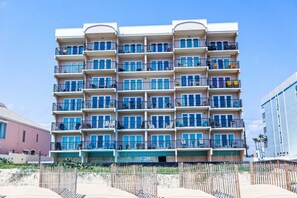 A multi-story hotel with balconies, a pool area, and a beach view. - Recently Remodeled Beachfront Escape at Florence 1 #307 - Corner Unit (South Padre Island)