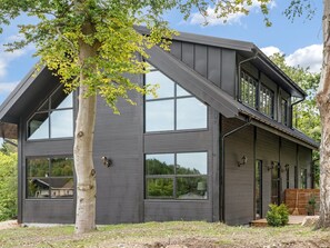 A modern two-story house with large windows and a sloped roof. - "Geeske" - 1.1km from the sea by Interhome (Ebeltoft)
