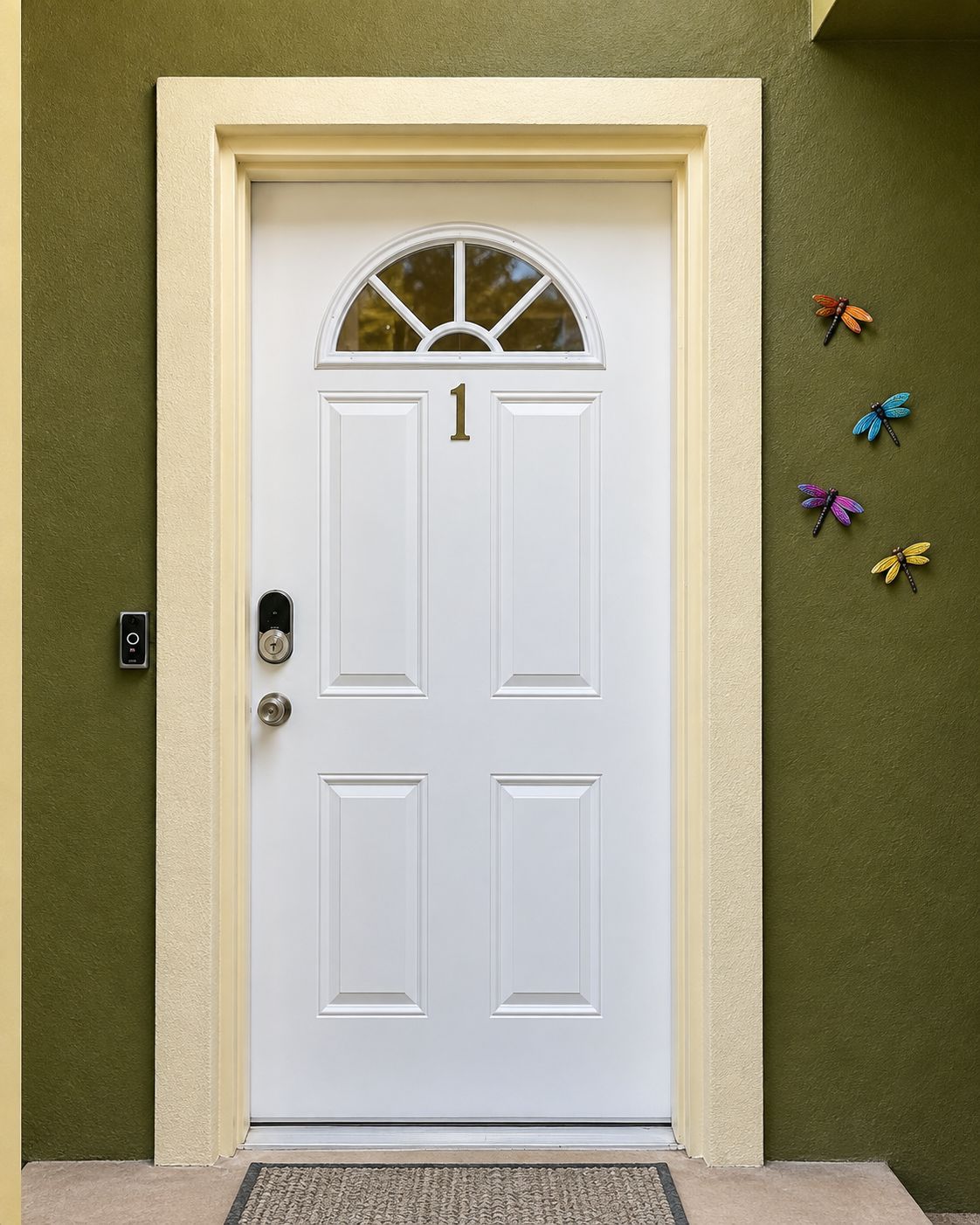 A white door with a number '1' above it, a keyhole, and a doorbell on the left.