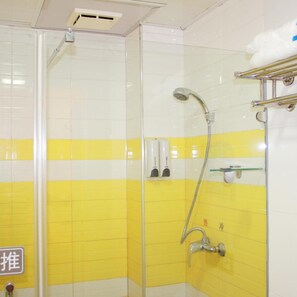 A shower area with yellow and white tiles, a glass door, a showerhead, and a towel rack. - 7 Days Premium Beijing Dujiakan Yuanbo (Beijing)