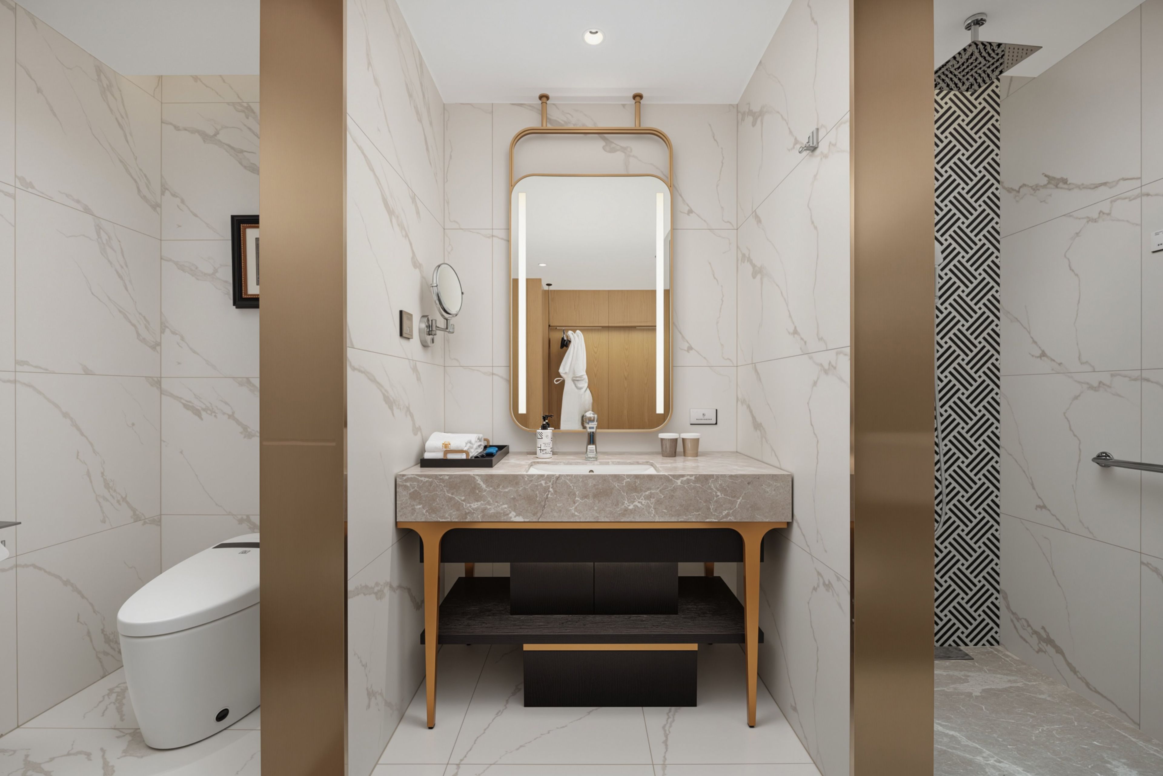 A modern bathroom with a marble vanity, a toilet, and a shower with a geometric tile pattern.