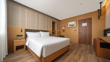 Superior Room, City View | Down duvets, free minibar, in-room safe, laptop workspace