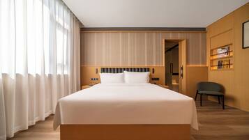 Superior Room, City View | Down duvets, free minibar, in-room safe, laptop workspace