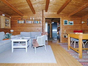 A log cabin interior with a living room, a dining area, and a kitchen. - 6 Person Holiday Home in Hundested (Hundested)