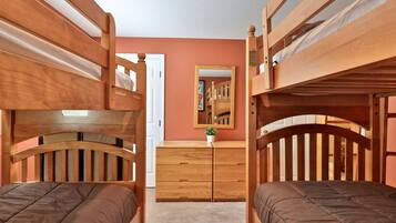 The third bedroom sleeps four in two sets of bunk beds, leaving the queen rooms for the rest of your group.