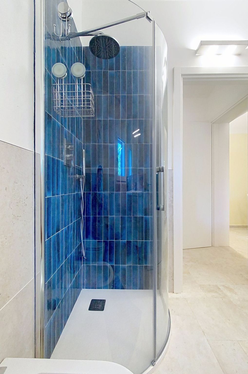 Blue, Flooring, Interior Design, Floor, Plumbing Fixture, Bathroom, Tile, Plumbing, Glass, Shower