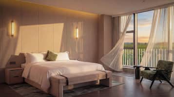 A modern bedroom with a large bed, bedside tables, a chair, and a view of the outdoors.