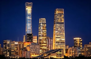 A city skyline with modern high-rise buildings at night. - Siye Serviced Residence (Beijing)