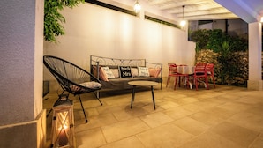 An outdoor patio area with a sofa, chairs, and a table. - 4-Bedroom Villa in Vis w/ Private Pool & Parking (Vis)