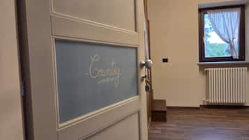 A door with a sign that reads 'Country.'
