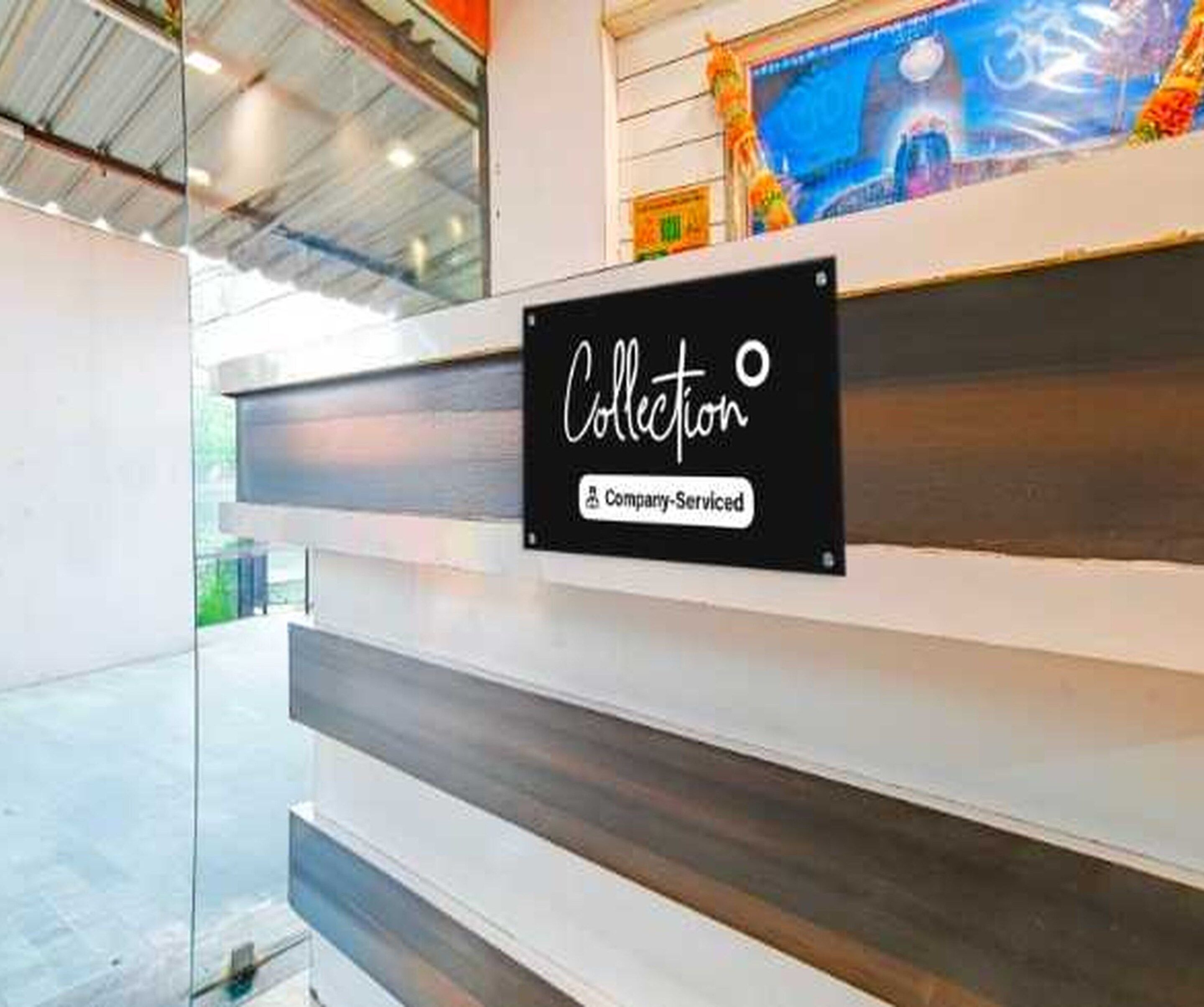 A sign with the word 'Collection' and a company service logo.