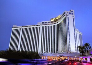 A large hotel with a prominent 'WESTGATE' sign, multiple floors, and a busy street in front.