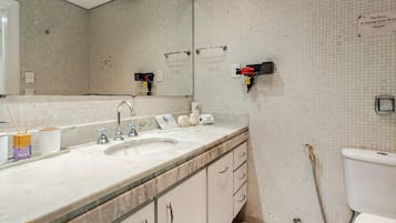 Hair dryer, towels, soap, toilet paper