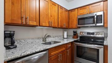 Open style kitchen stocked with all the basics for an island feast
