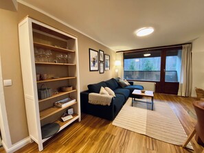 Living area - Cozy holiday apartment with a wood-burning stove in the Harz Mountains. (Langelsheim)