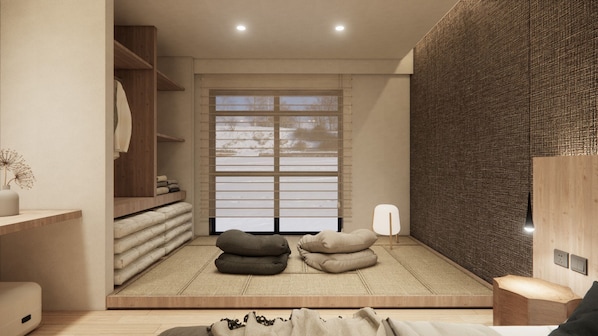 Ein schlichtes Zimmer mit Tatami-Böden, einer Schiebetür mit Ausblick und einem Holzschrank.