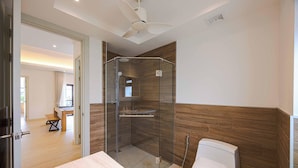 A modern bathroom with a glass-enclosed shower, a toilet, and a vanity with a marble countertop. - Modern 3BR Villa w/ Private Pool (MV55) (Hua Hin)