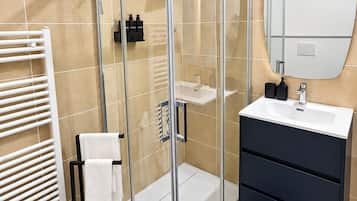 Hair dryer, bidet, towels, soap