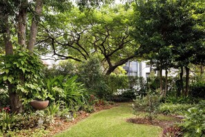 The building gardens outside the bedroom window... - New Farm Hideaway with Courtyard - 2Bed-1Bath-1Car (New Farm)