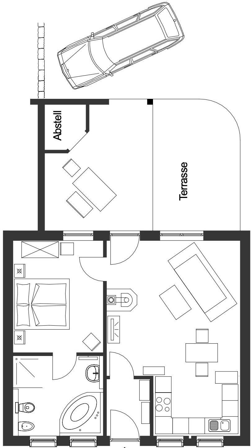 Ein Grundriss mit Terrasse, Bad, Küche und Essbereich.