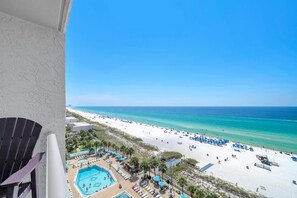 A resort with a pool, beach, and ocean view. - The Summit 1109 (Panama City Beach)