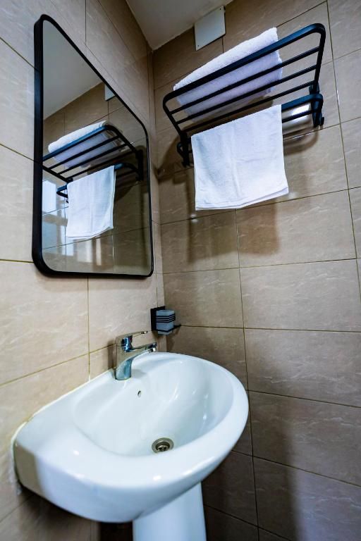 Slippers, towels, soap, toilet paper
