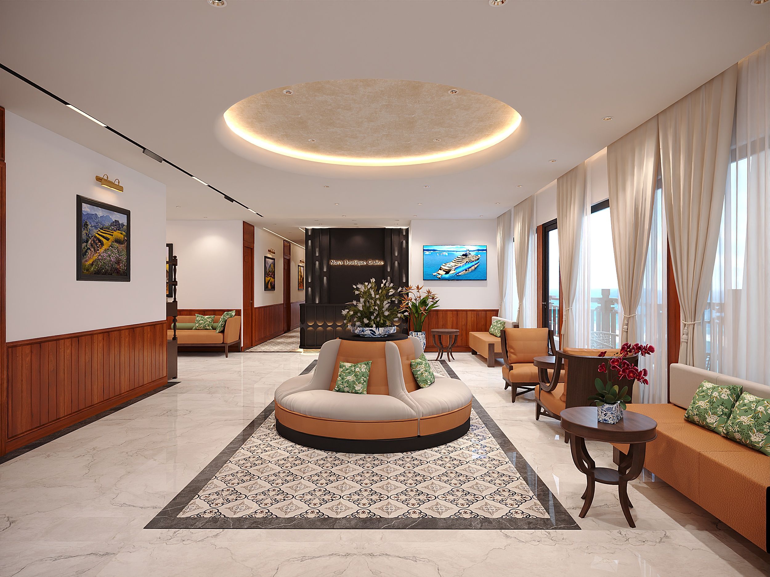A hotel lobby with a round seating area, a reception desk, and a large TV screen.