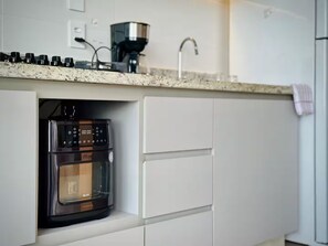 Private kitchen - 2-bedroom apartment near 44th Street | Swimming pool | Garage | Air conditioning (Goiânia)