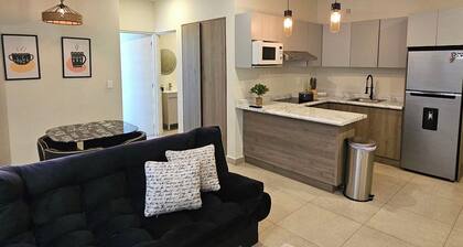 Steps from Arena Monterrey 1BR Condo + Parking