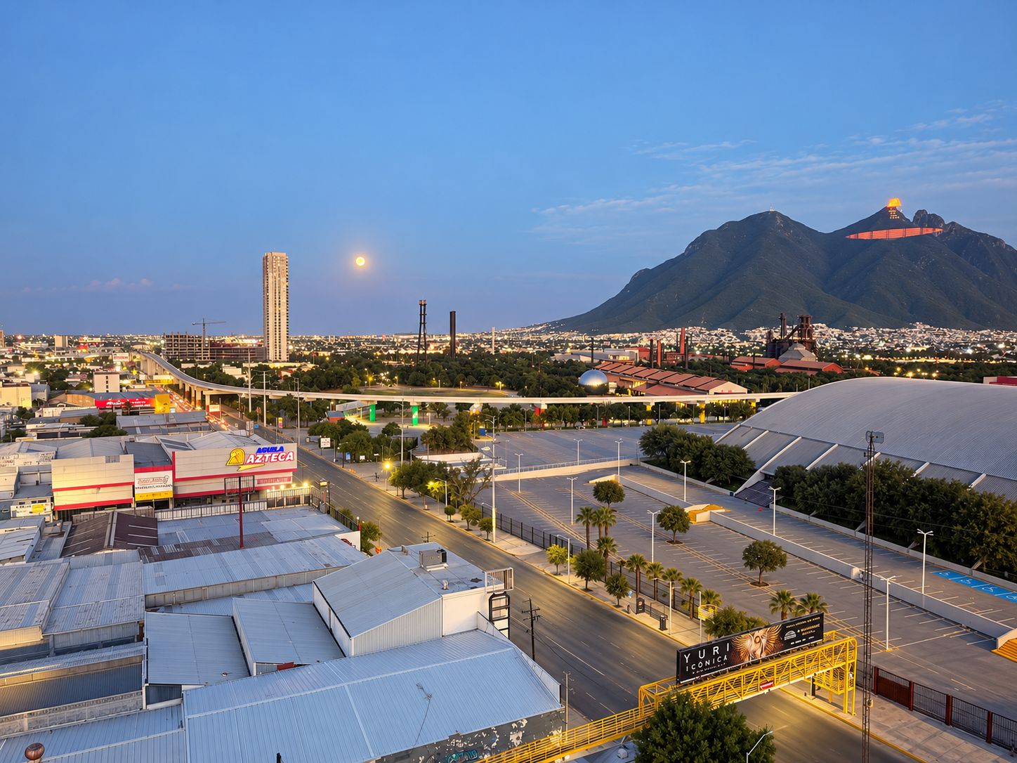 A cityscape with a prominent mountain in the background, a large industrial area with warehouses, and a highway with overpasses.