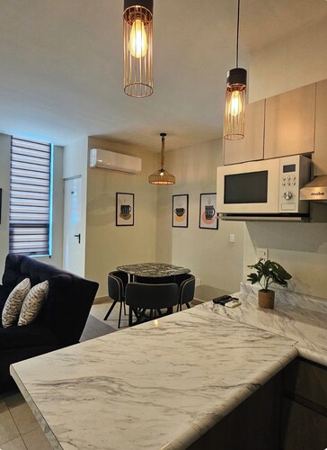  Steps from Arena Monterrey 1BR Condo + Parking