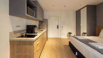 Apartment, Balcony | Private kitchenette | Microwave, stovetop, cookware/dishes/utensils